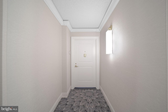 hall with crown molding and a textured ceiling