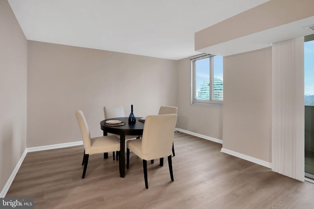 dining room featuring hardwood / wood-style flooring