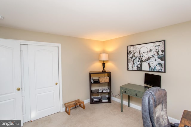 office area with light colored carpet