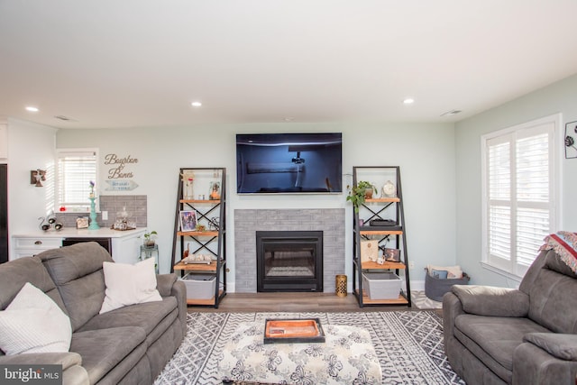 living room with light hardwood / wood-style floors