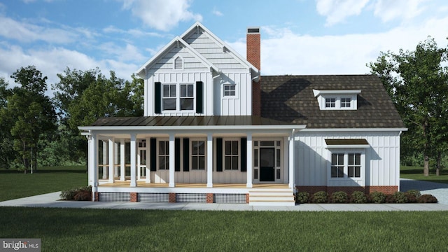 modern inspired farmhouse with board and batten siding, a front yard, a porch, and a chimney