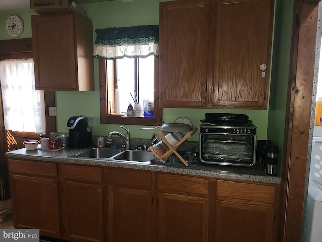 kitchen with plenty of natural light and sink