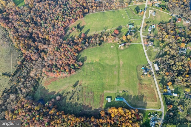 birds eye view of property featuring a rural view