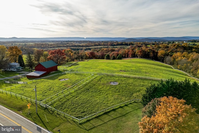 bird's eye view featuring a mountain view and a rural view