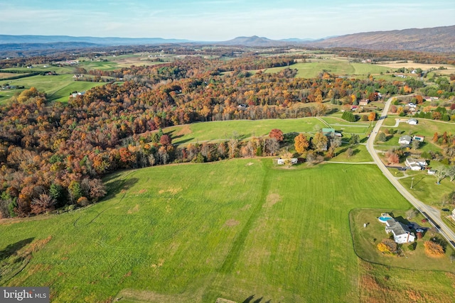 aerial view with a mountain view and a rural view