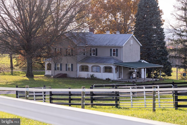 view of front of home featuring a front lawn