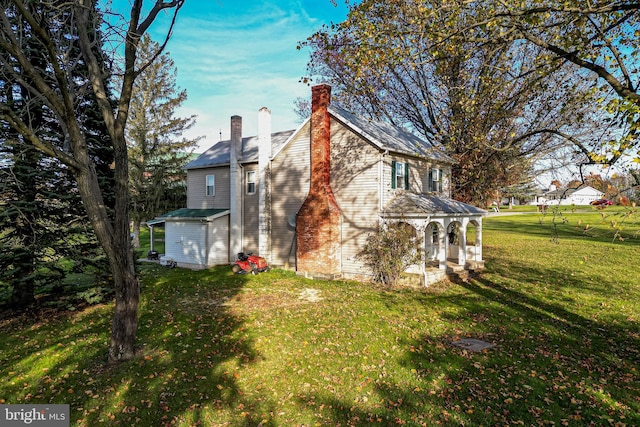 view of property exterior featuring a lawn