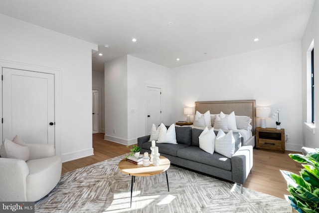 bedroom with light hardwood / wood-style flooring