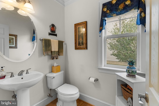 bathroom featuring toilet and sink