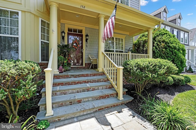 property entrance with a porch