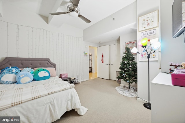 carpeted bedroom featuring ceiling fan