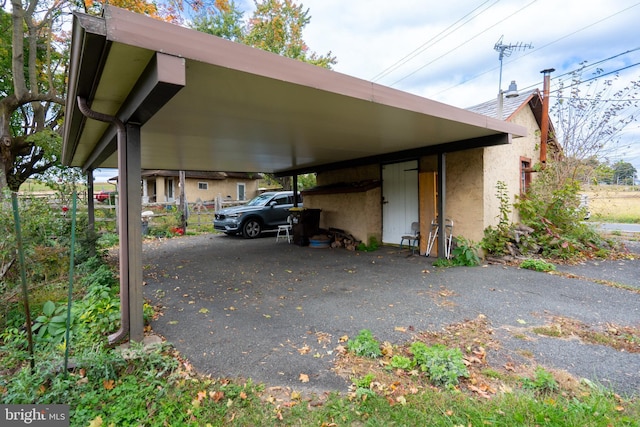 view of car parking with a carport