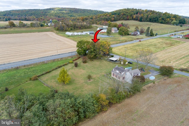 birds eye view of property featuring a rural view