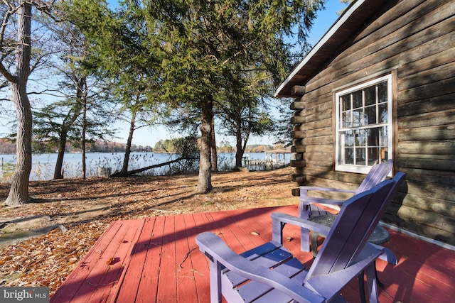 wooden terrace with a water view