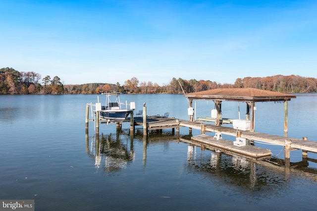 view of dock with a water view