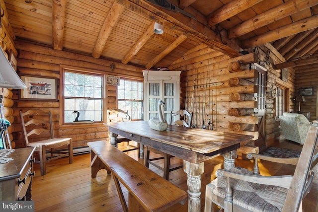 dining room with rustic walls, light hardwood / wood-style flooring, wooden ceiling, and vaulted ceiling with beams