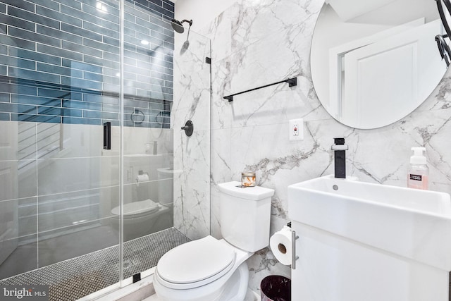 bathroom featuring vanity, decorative backsplash, toilet, tile walls, and an enclosed shower