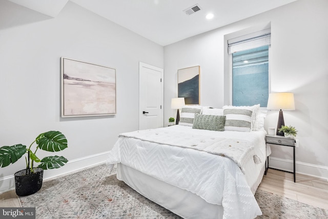 bedroom featuring light hardwood / wood-style flooring