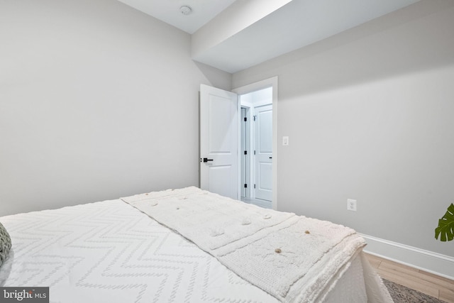 bedroom featuring hardwood / wood-style floors