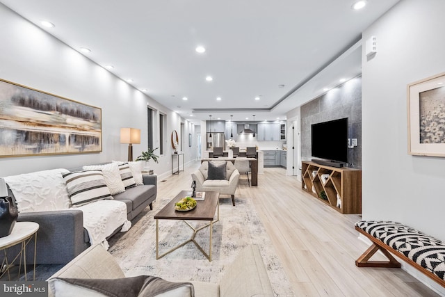 living room with light hardwood / wood-style floors