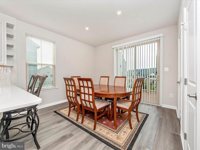 dining room with hardwood / wood-style floors