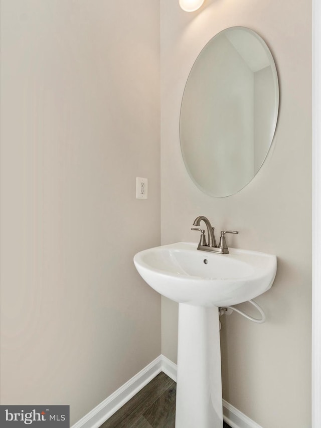 bathroom featuring hardwood / wood-style flooring