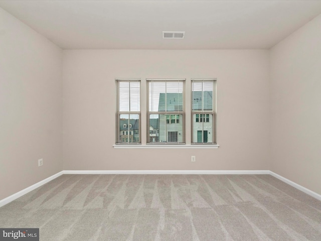 view of carpeted spare room