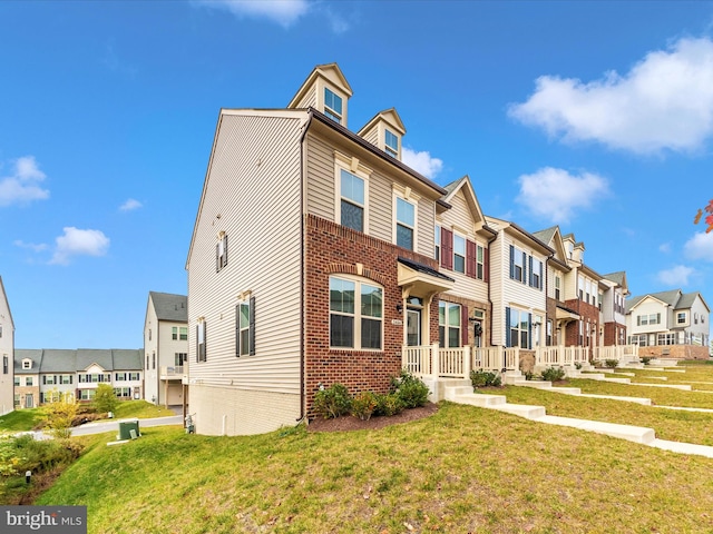 view of property featuring a front yard