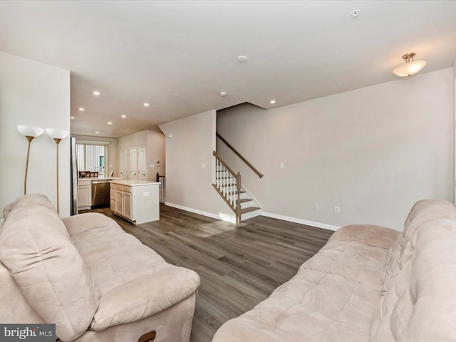 living room featuring dark wood-type flooring