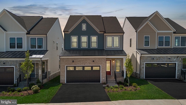 view of front of home with a garage