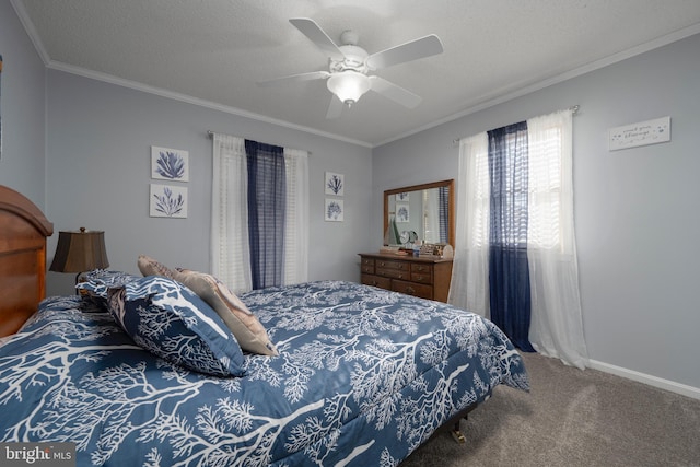 bedroom with a textured ceiling, ceiling fan, carpet floors, and crown molding