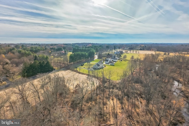 birds eye view of property with a rural view