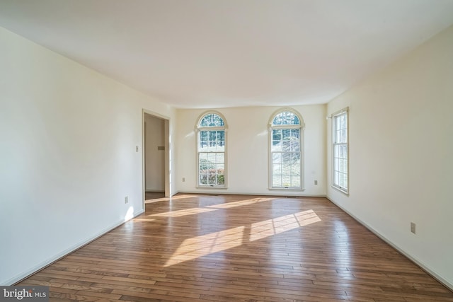 empty room featuring hardwood / wood-style floors