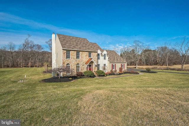 view of front of house with a front lawn