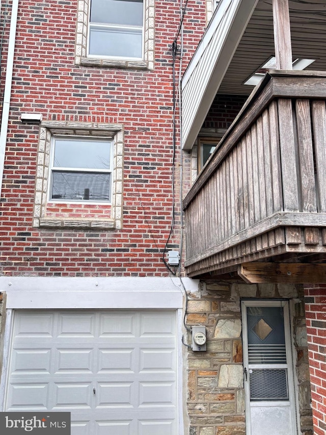 view of side of property with a garage