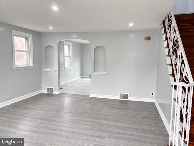 spare room featuring light wood-type flooring