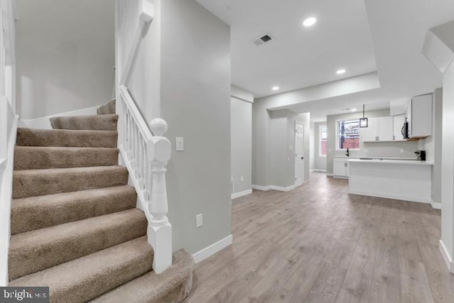 living room featuring light wood-type flooring