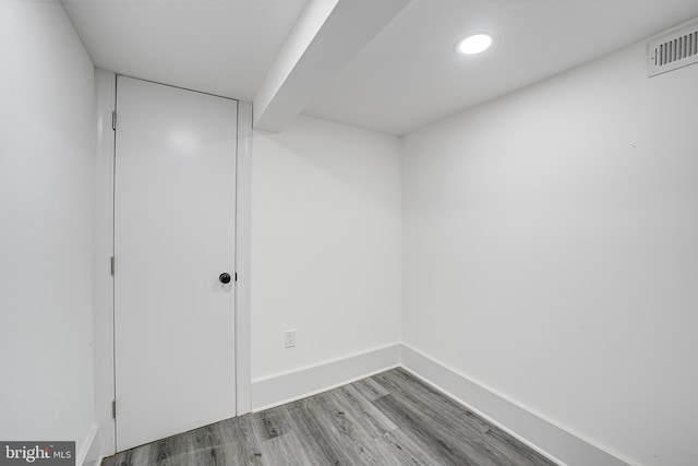 spare room featuring light hardwood / wood-style flooring