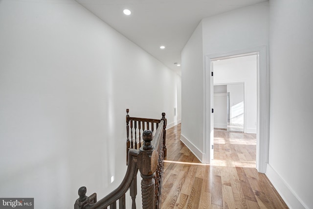 hallway with light wood-type flooring