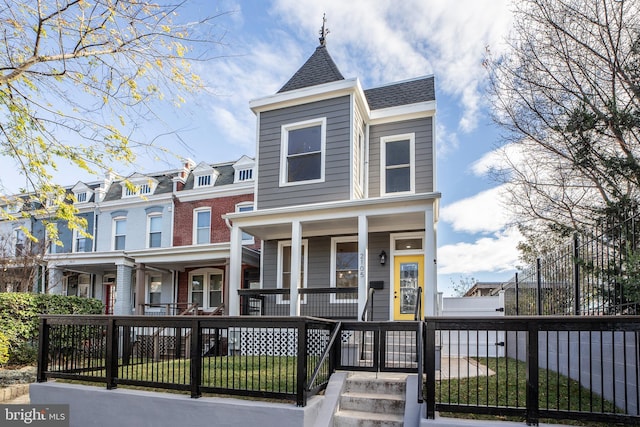 victorian house featuring covered porch