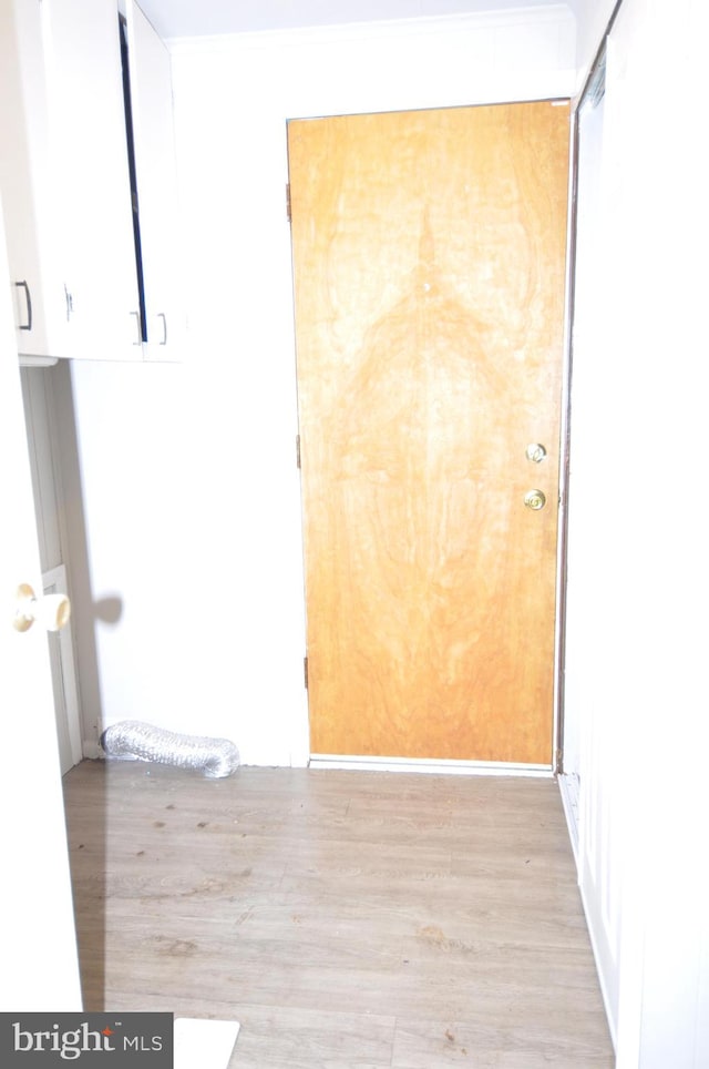 hallway featuring light wood-type flooring