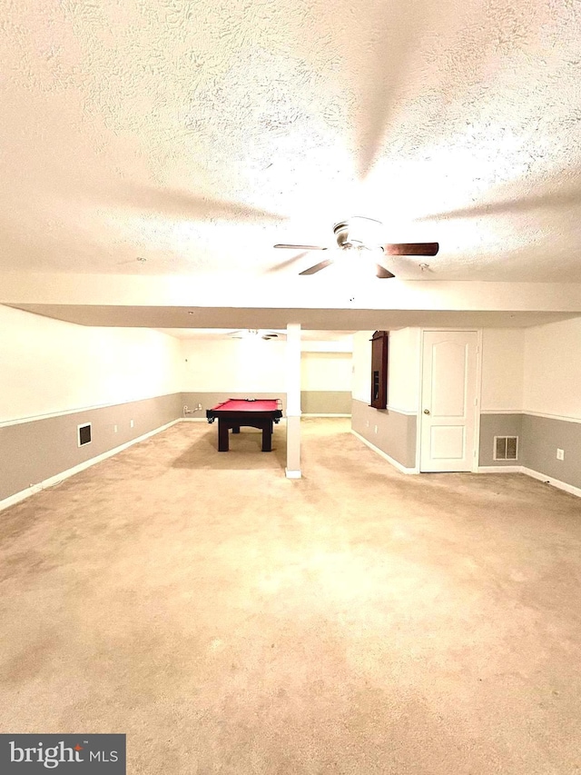 rec room featuring ceiling fan, pool table, carpet floors, and a textured ceiling