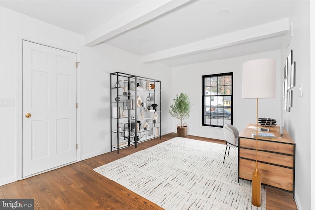 office space featuring beamed ceiling and wood-type flooring