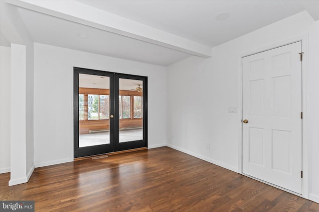 unfurnished room featuring beam ceiling, french doors, and dark wood-type flooring