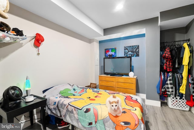 bedroom featuring hardwood / wood-style floors