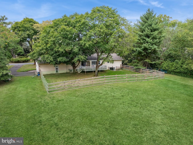 view of yard featuring a wooden deck