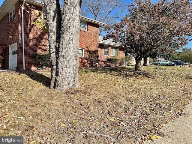 view of home's exterior with a garage