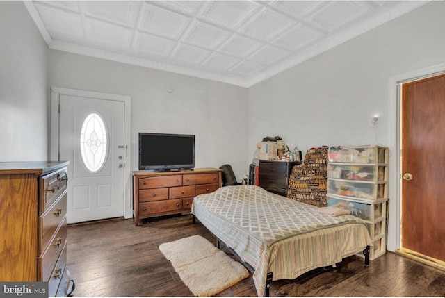 bedroom featuring dark hardwood / wood-style flooring