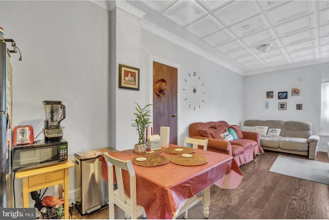 dining area featuring dark wood-type flooring