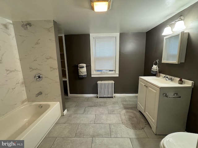 bathroom with radiator heating unit, vanity, tile patterned floors, and tiled shower / bath combo